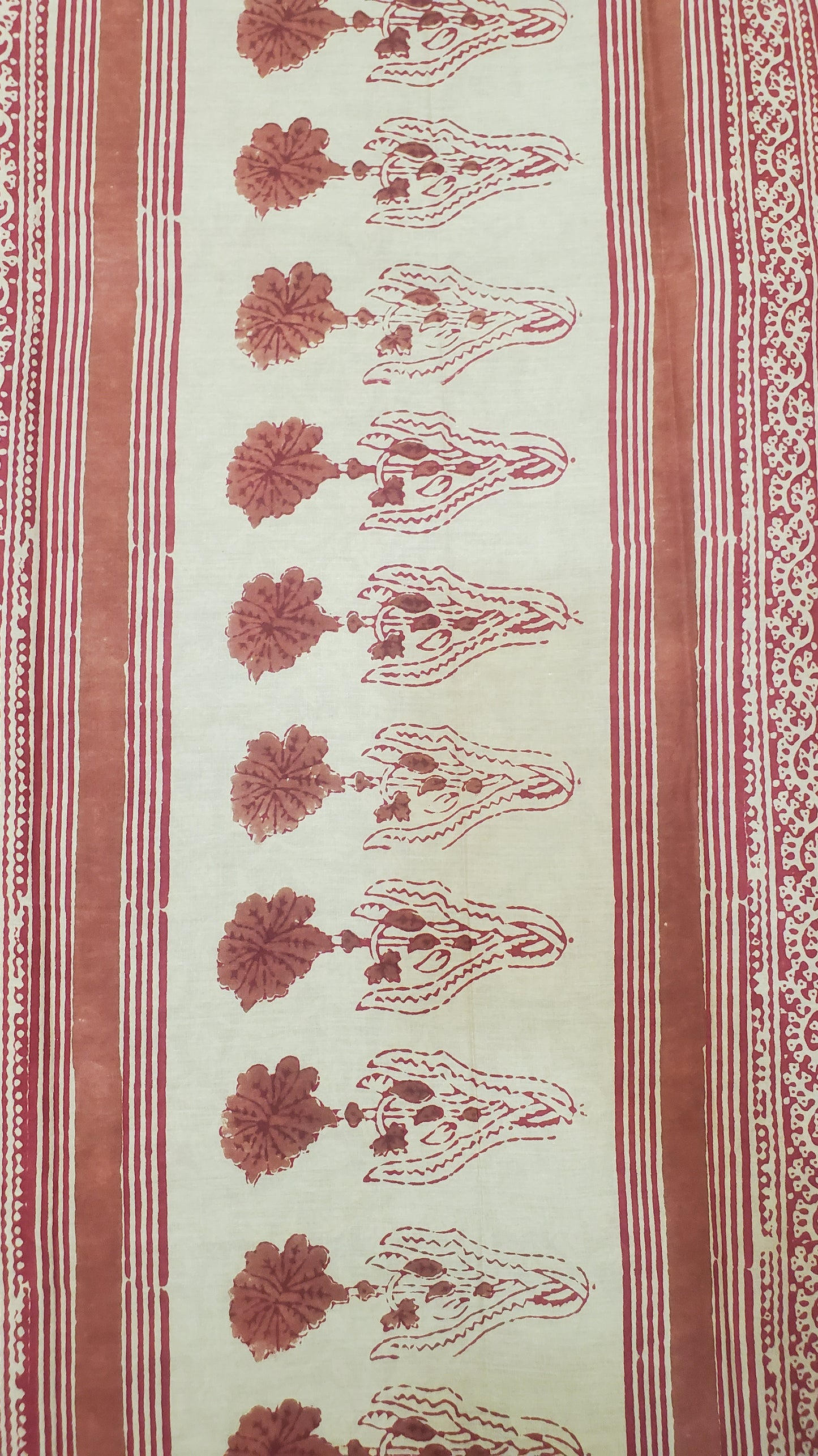 Deep red, adorned with intricate floral block prints