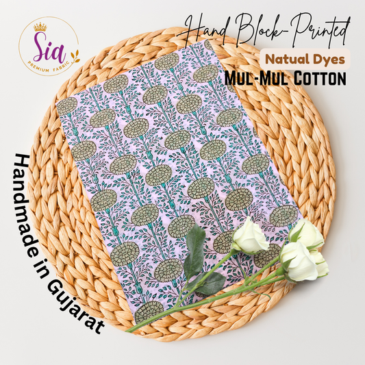 Floral vines in sage green and teal, hand block-printed on breathable mul-mul cotton, is a celebration of craft and culture - Sia Premium Fabric