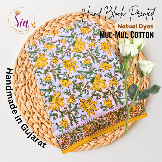 Vibrant hand block-printed piece features bold yellow florals dancing over soft lilac mul-mul cotton — a sun-kissed tribute to tradition - Sia Premium Fabric