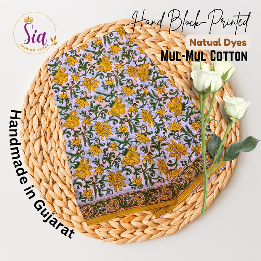 Vibrant hand block-printed piece features bold yellow florals dancing over soft lilac mul-mul cotton — a sun-kissed tribute to tradition - Sia Premium Fabric