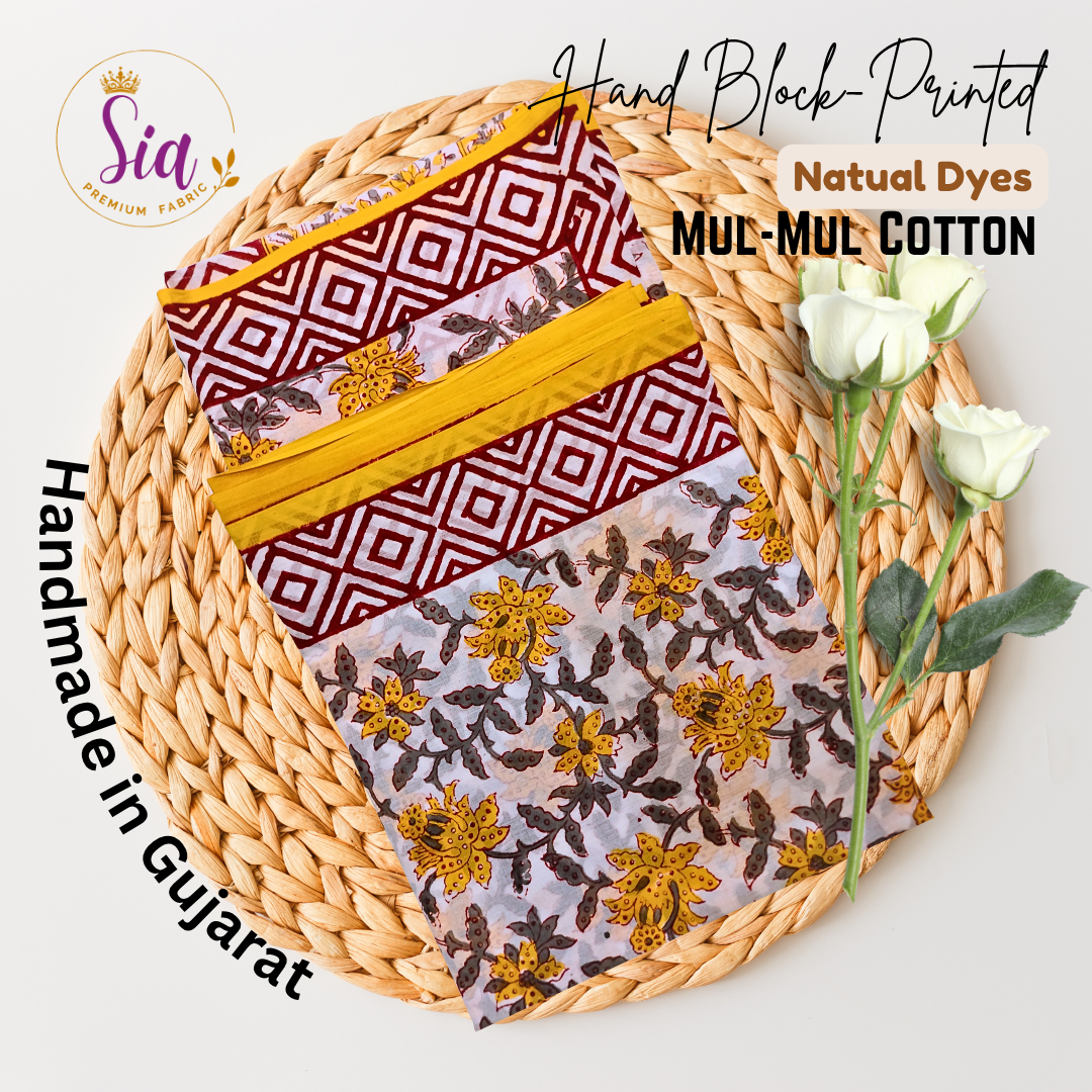 Striking blend of geometric maroon patterns with vibrant yellow floral handblock prints on soft mul-mul cotton - Sia Premium Fabric