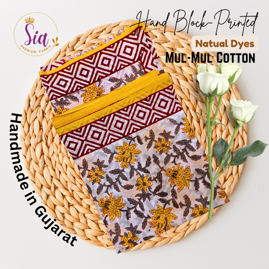 Striking blend of geometric maroon patterns with vibrant yellow floral handblock prints on soft mul-mul cotton - Sia Premium Fabric