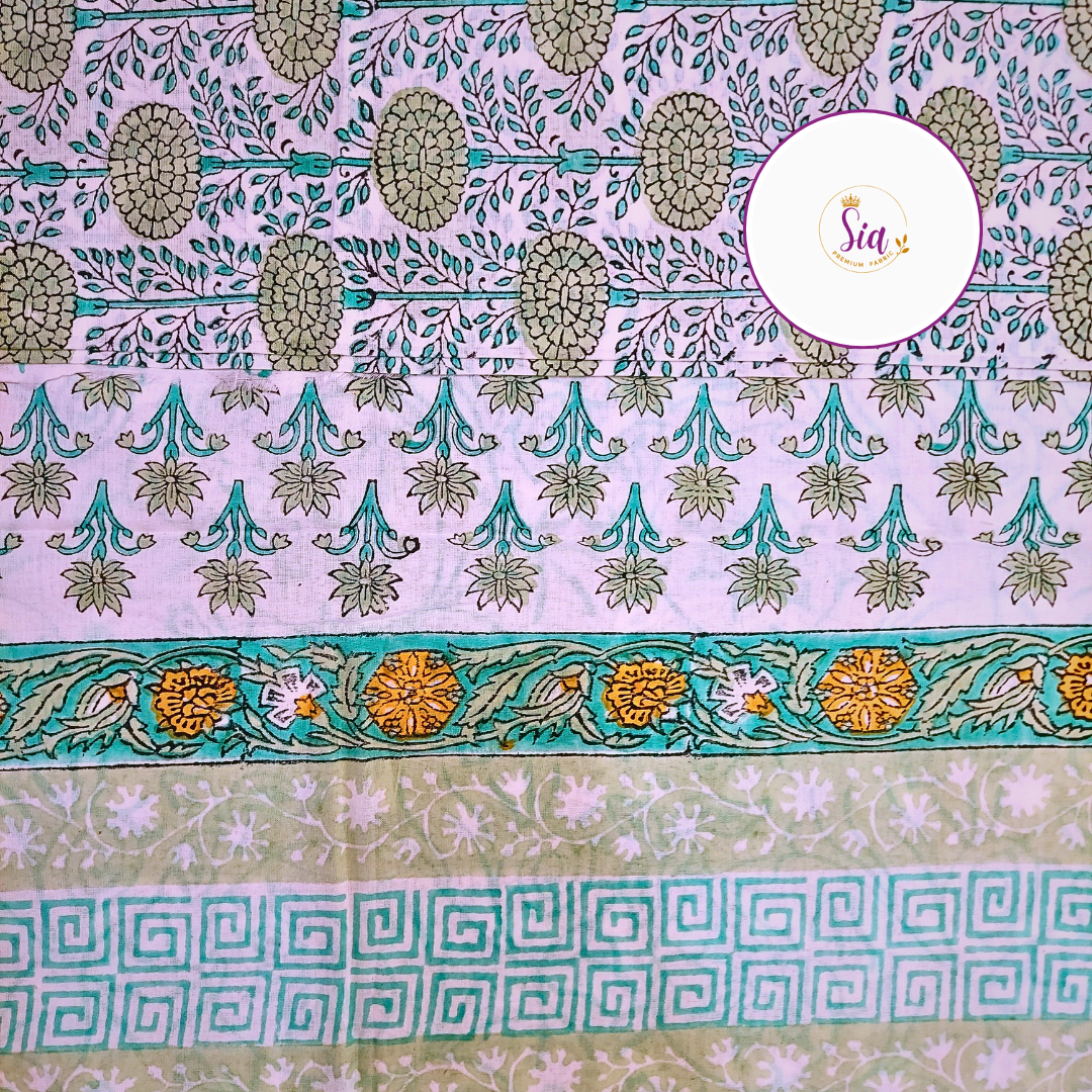 Floral vines in sage green and teal, hand block-printed on breathable mul-mul cotton, is a celebration of craft and culture - Sia Premium Fabric