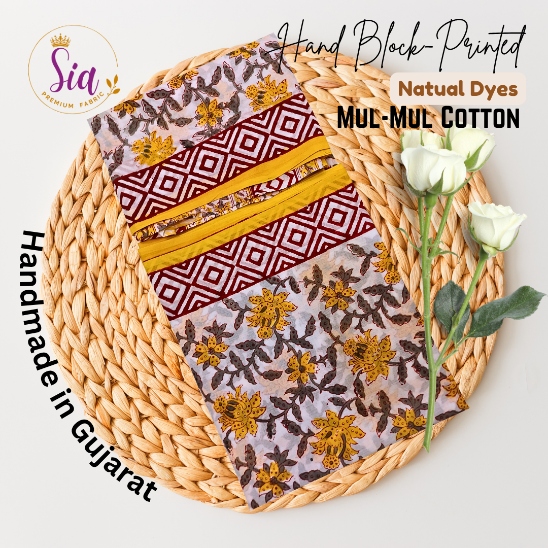 Striking blend of geometric maroon patterns with vibrant yellow floral handblock prints on soft mul-mul cotton - Sia Premium Fabric