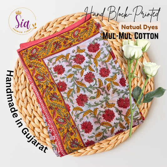 Radiant combination of deep red blooms and mustard vines, hand block-printed on airy mul-mul cotton, is a celebration of timeless craft - Sia Premium Fabric