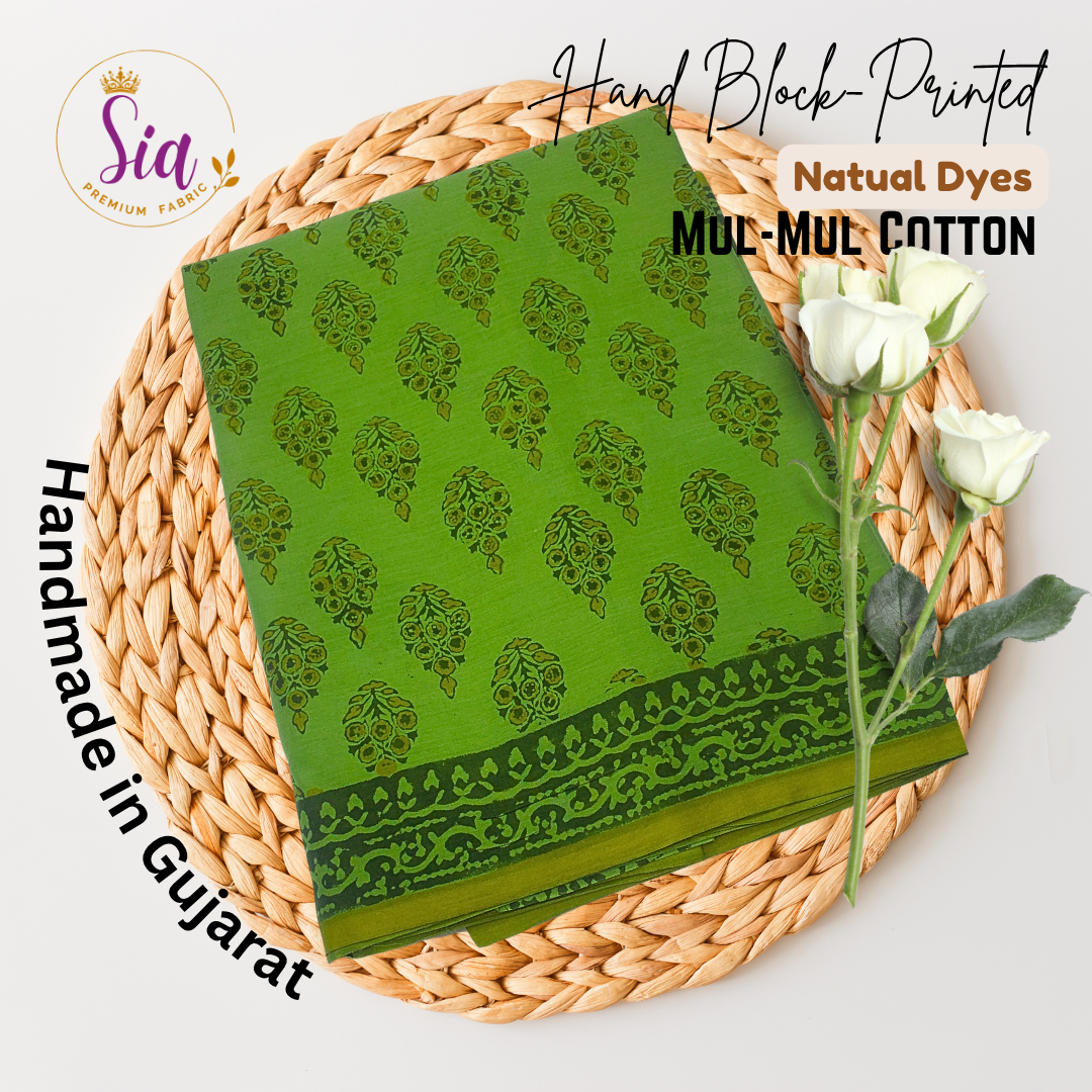 Lush green saree with intricate floral motifs