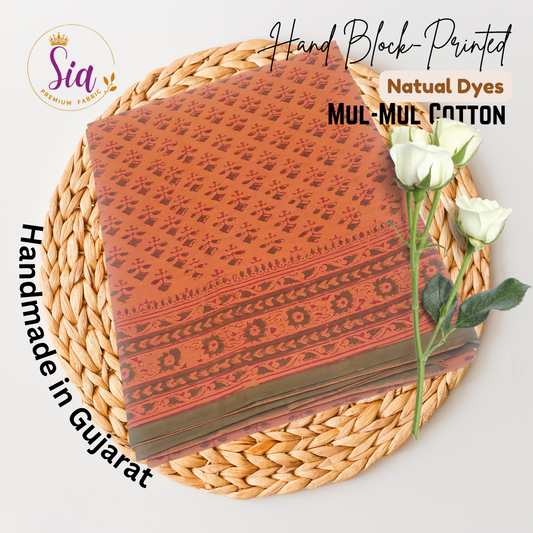 Rust orange beauty features classic hand block floral motifs and intricate borders