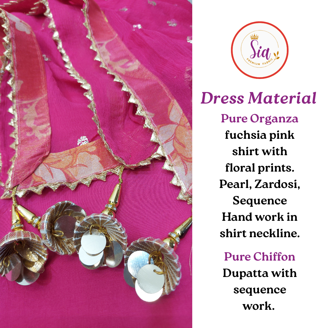 Premium Pure Organza with Handwork in a vibrant Fuchsia Pink, enhanced with delicate floral prints.