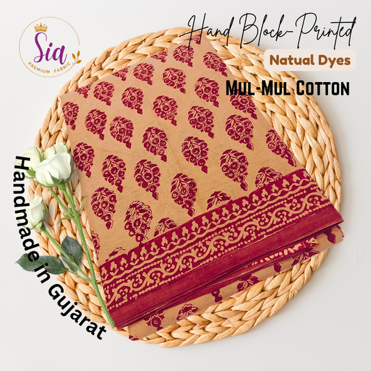 Rich maroon hand block prints on a warm earthy base
