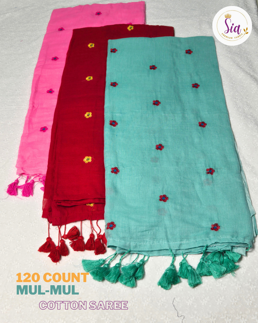 Pink - Mul-Mul cotton, 120 thread count with embroidered floral motifs.