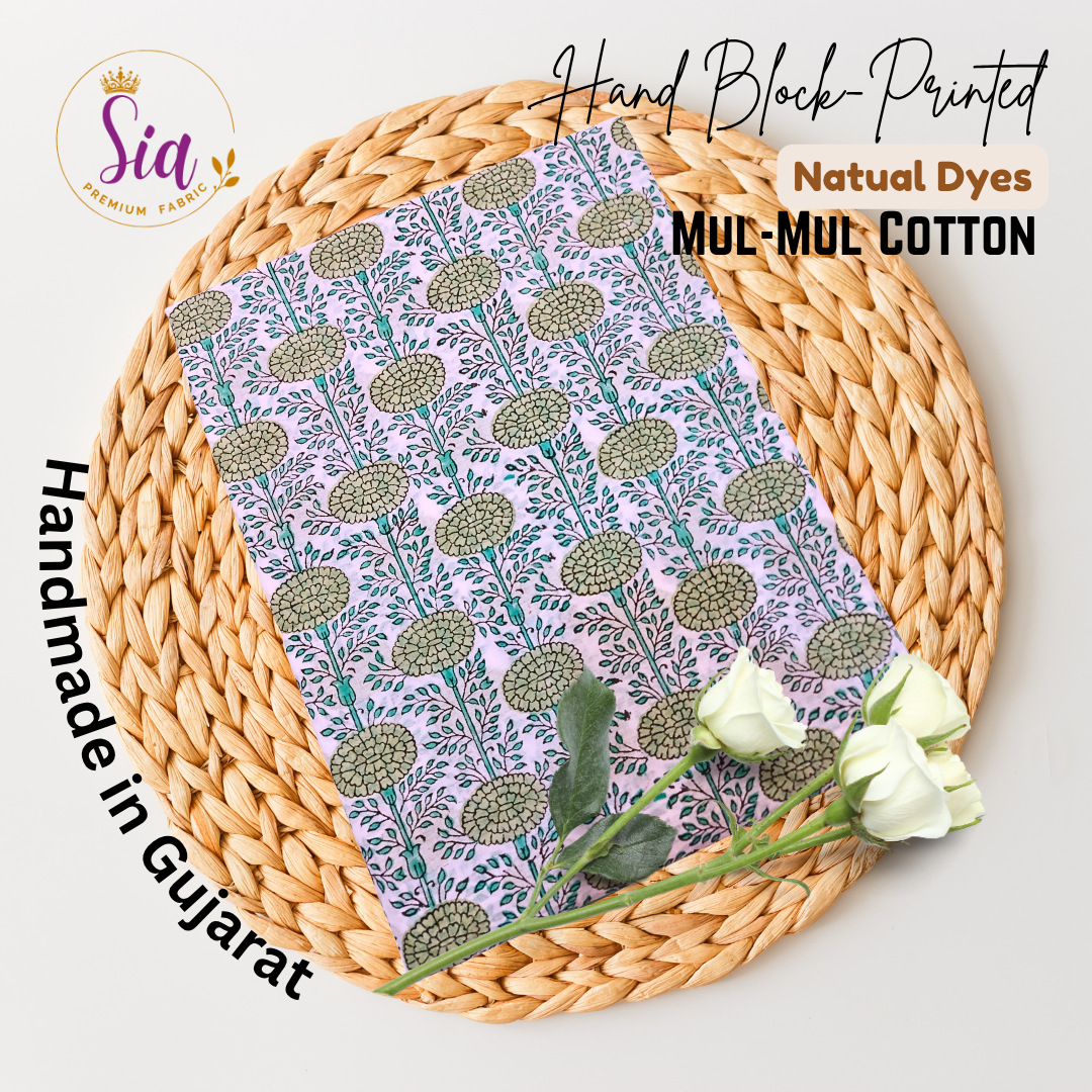 Floral vines in sage green and teal, hand block-printed on breathable mul-mul cotton, is a celebration of craft and culture - Sia Premium Fabric