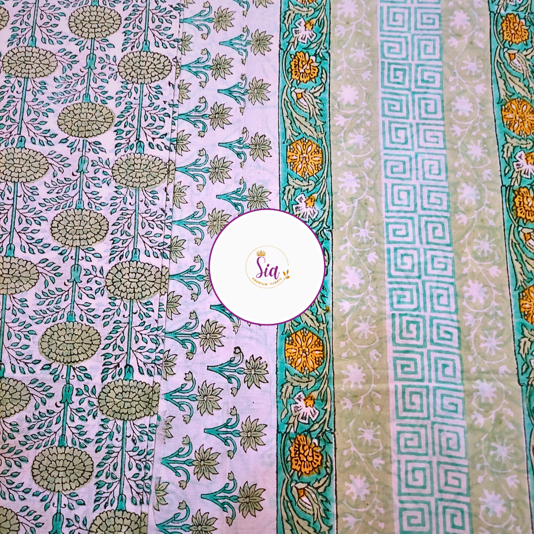 Floral vines in sage green and teal, hand block-printed on breathable mul-mul cotton, is a celebration of craft and culture - Sia Premium Fabric