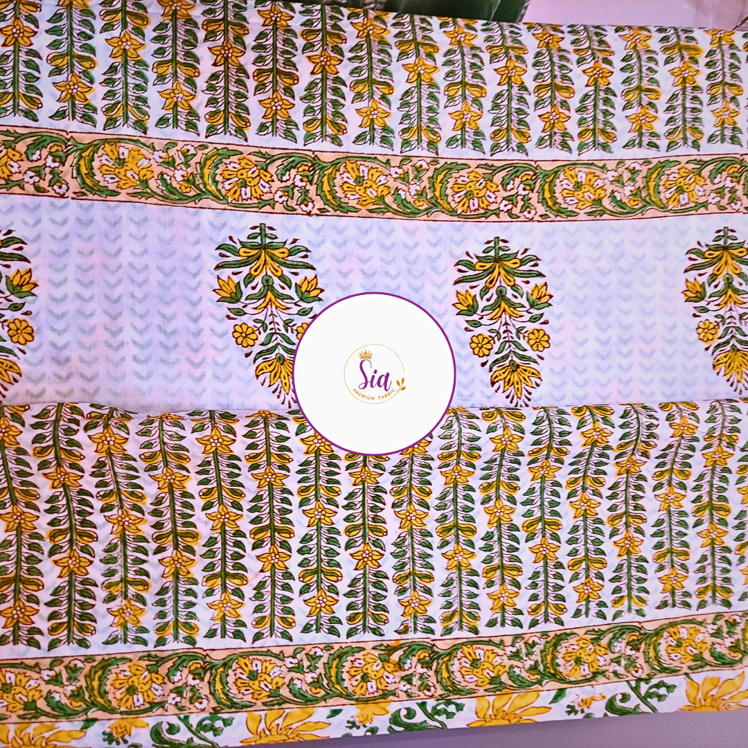 Vibrant hand block-printed piece features bold yellow florals dancing over soft lilac mul-mul cotton — a sun-kissed tribute to tradition - Sia Premium Fabric