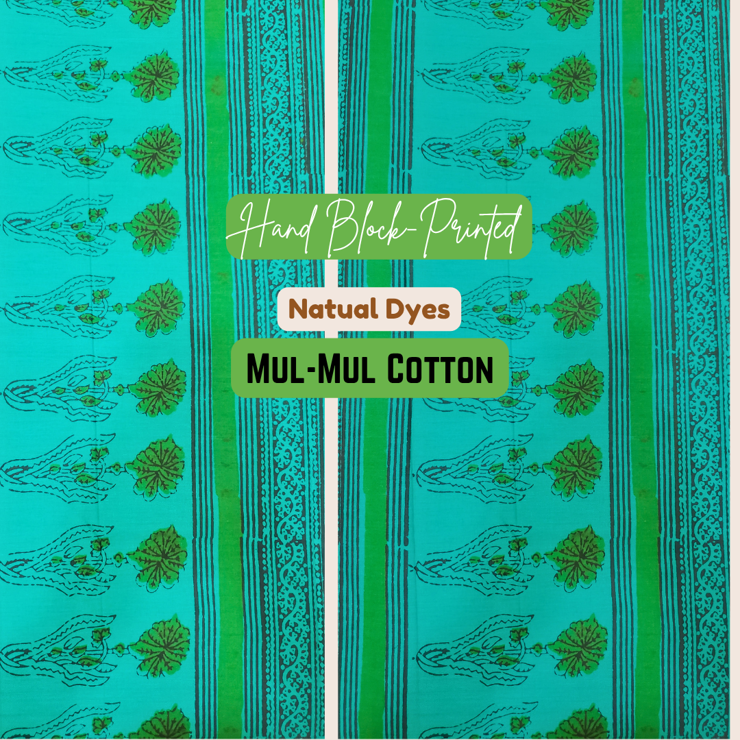 Vibrant green saree with intricate floral block prints in deep indigo tones