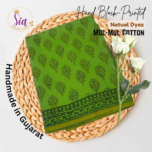 Lush green saree with intricate floral motifs