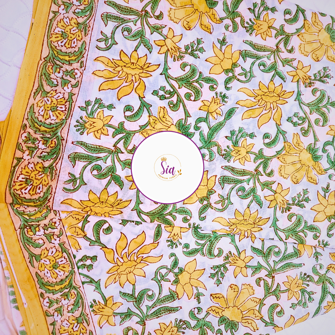 Vibrant hand block-printed piece features bold yellow florals dancing over soft lilac mul-mul cotton — a sun-kissed tribute to tradition - Sia Premium Fabric