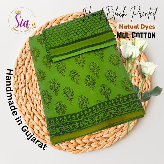 Lush green saree with intricate floral motifs